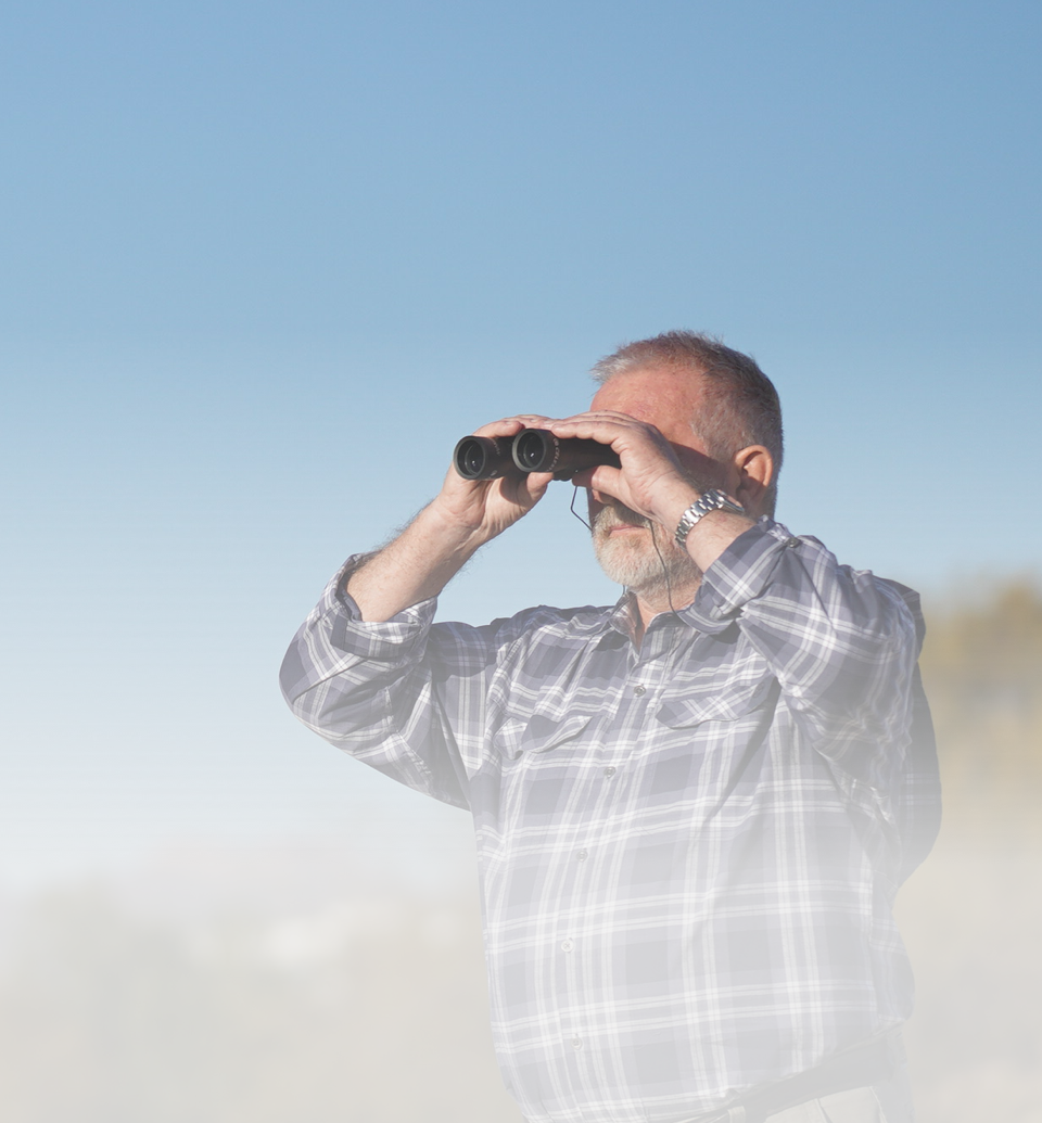 Acthar Gel patient: Gary looking through binoculars